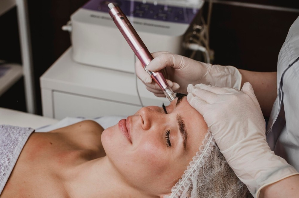 a woman getting a skin tightening treatment in appolo beach fl
