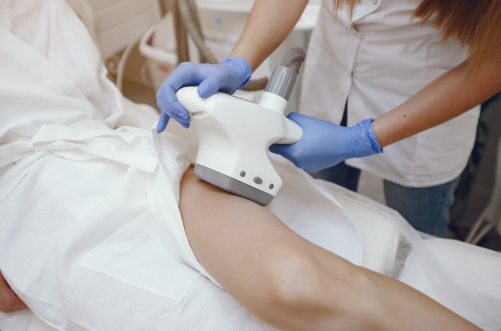 a woman getting laser hair removal clinic in lakewood ranch fl on her leg