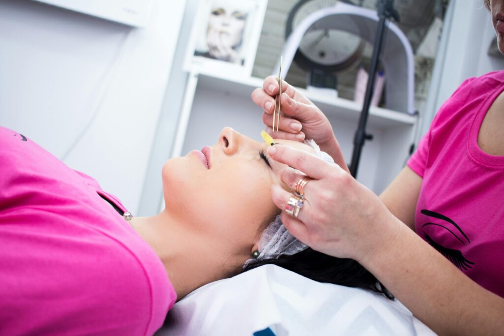 a woman in magenta shirt having a med spa in bradenton fl