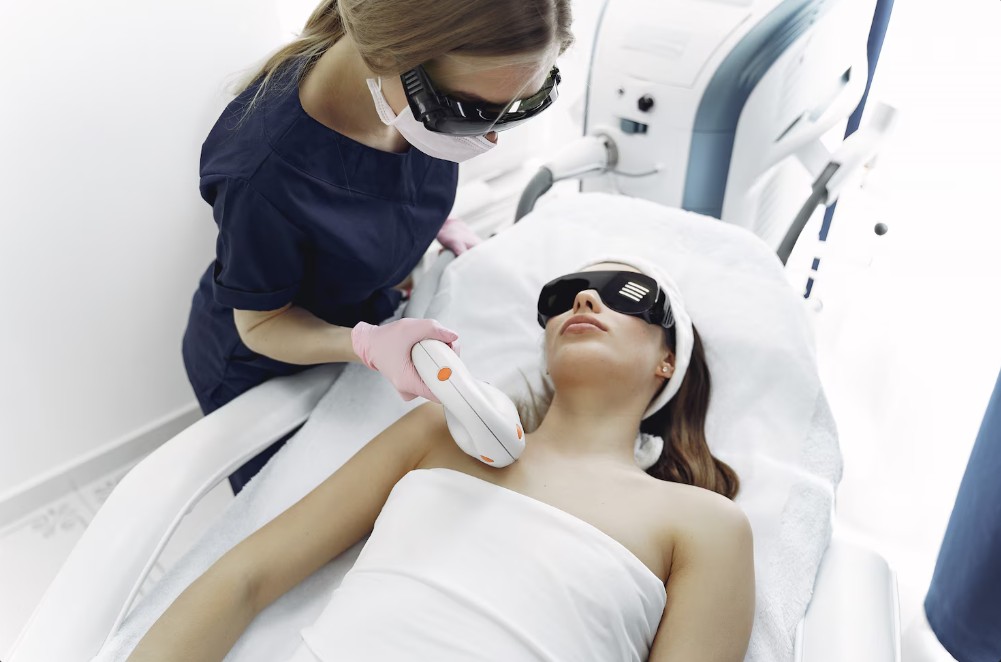 a woman in shades getting her laser hair removal in bradenton fl