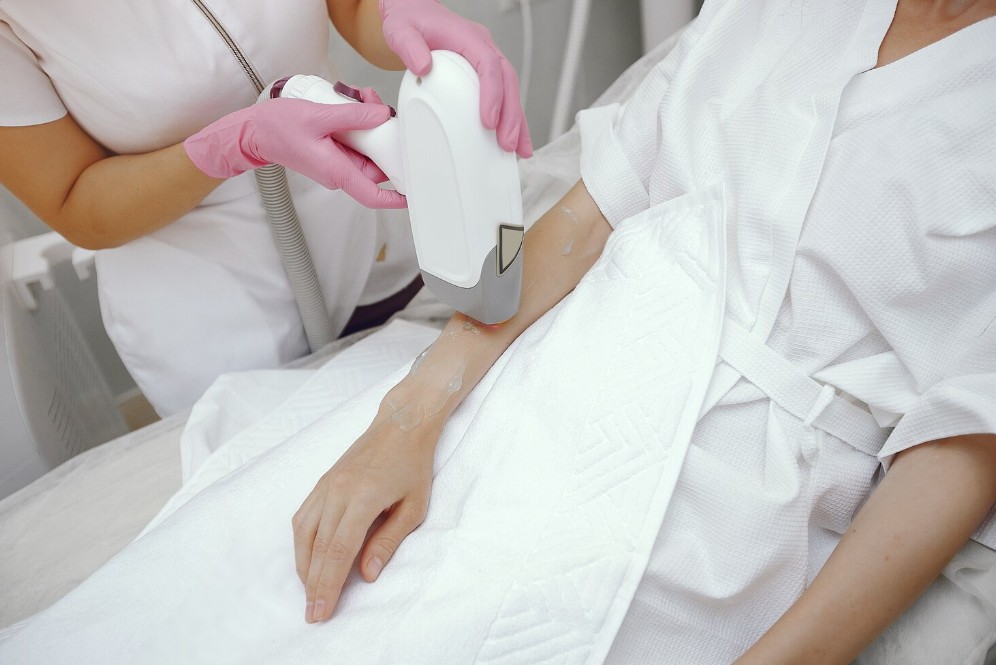 patient getting assisted in laser hair removal clinic in parrish fl